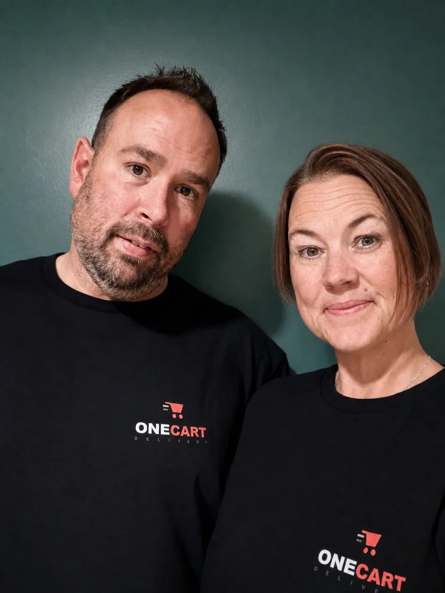 The local owners of OneCart Delivery wearing OneCart shirts